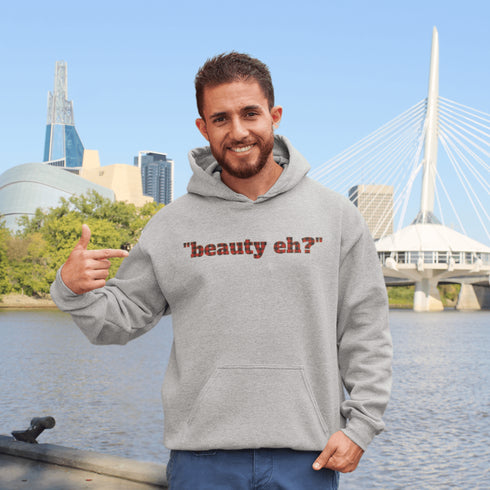 For all the true Canadians out there, here’s the “Beauty, Eh?” Hoodie, featuring bold red & black plaid lettering that just screams Great White North.